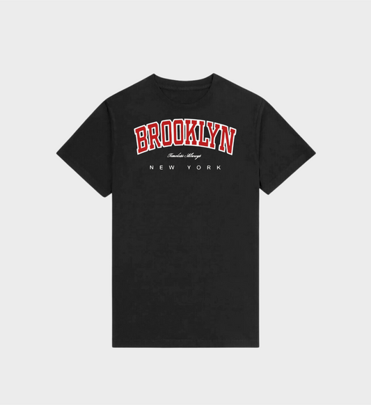 Brooklyn T-Shirt in Black with red Brooklyn design, unisex, 100% cotton, shrunk-free, regular fit, oversized look, size guide for men and women.