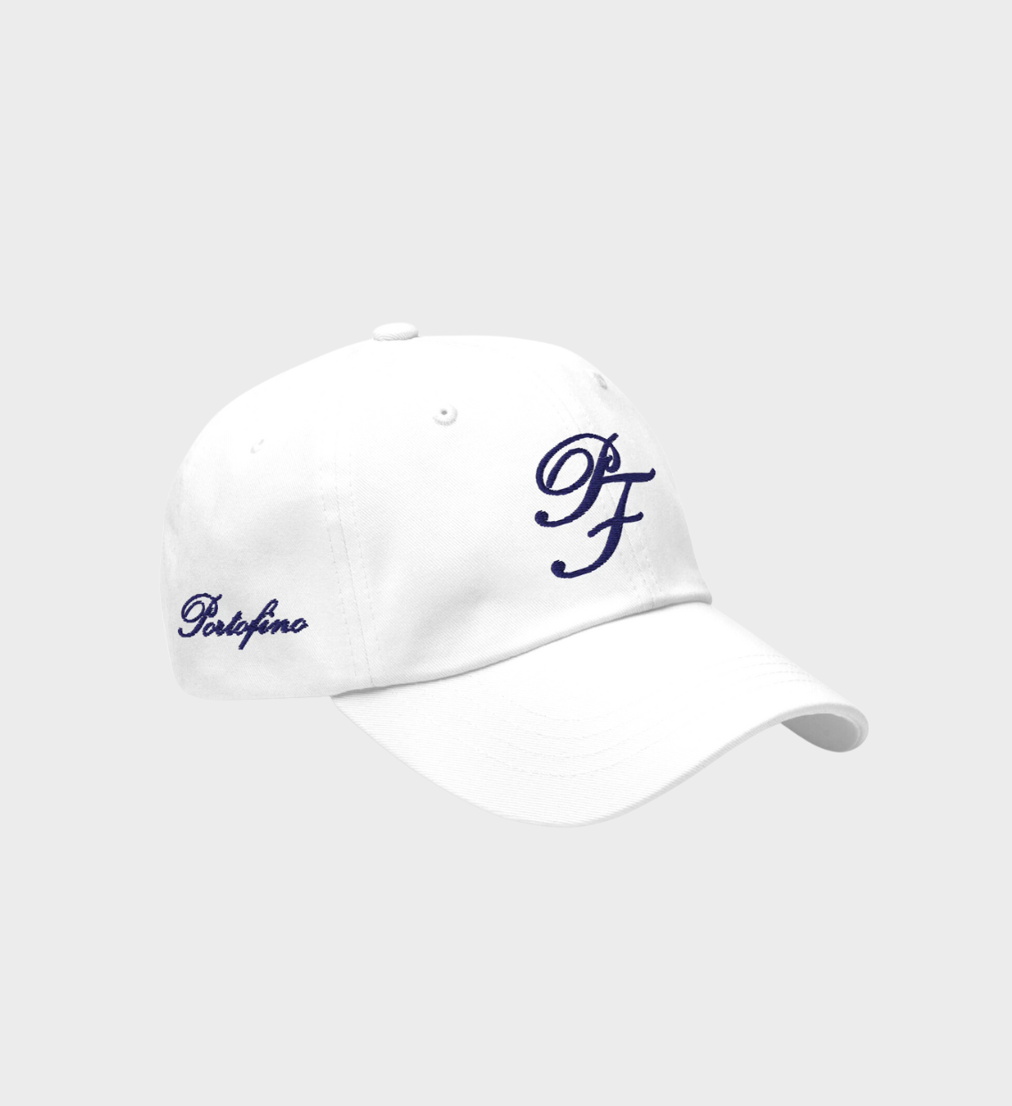 White dad hat with navy PF logo inspired by Portofino elegance